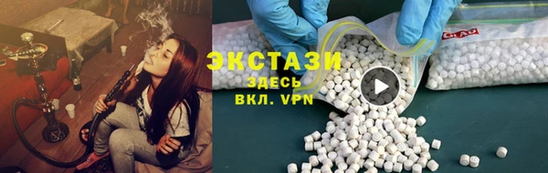 твердый Мегион